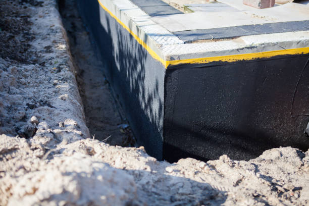 Professional Waterproofing technician working in Portageville, NY